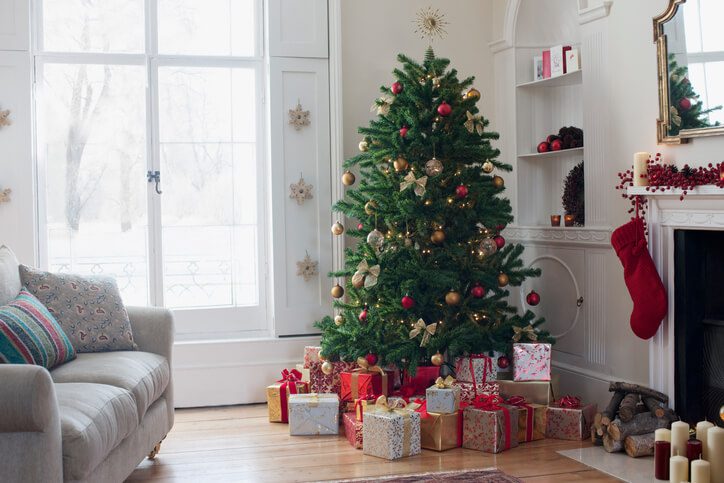 Christmas tree with presents and holiday decor, contact the Lombard family law lawyers for help with your child support case.