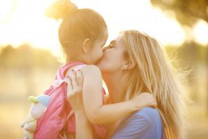 Mother and her daughter embracing you'll need Family Law Attorney Downers Grove to help with custody modifications.